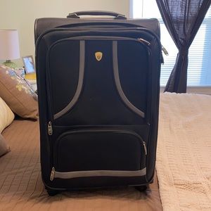 Black luggage bag with wheels